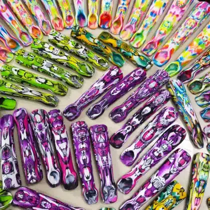 wide variety of bulk spoons displayed on a white background